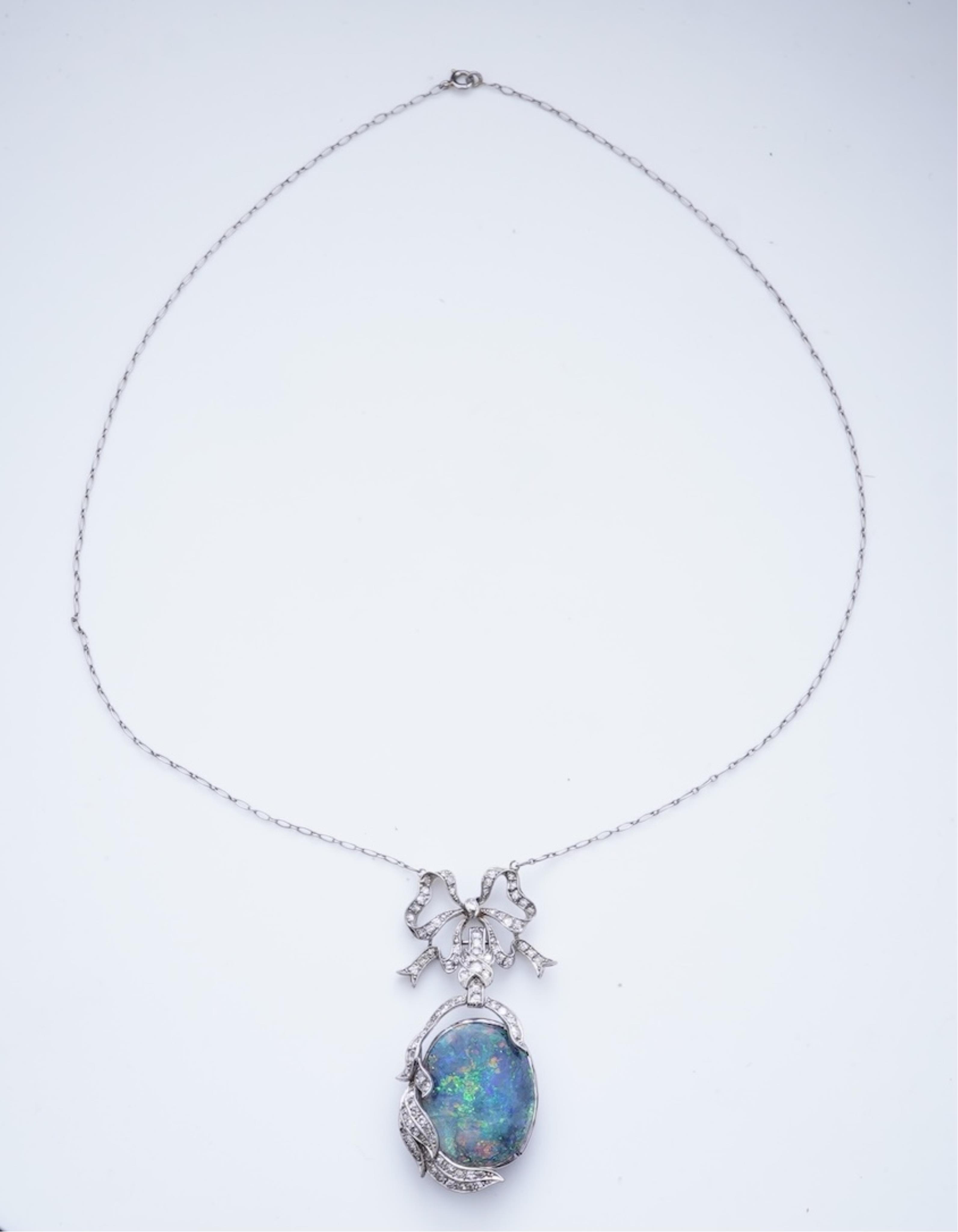 An impressive Belle Epoque black opal and diamond pendant, early 20th century